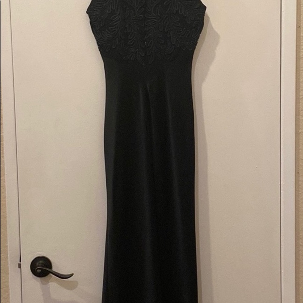 A Carmen Marc Valvo dress.
